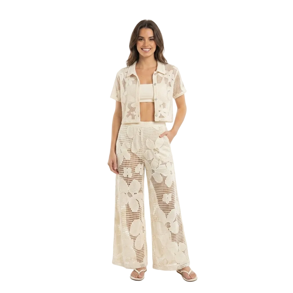 Woman wearing a matching lace outfit on a white background